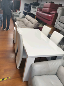 65 High gloss white table and leather chairs 