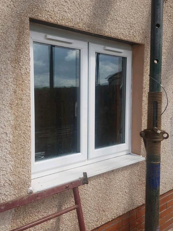 Double glazed, white upvc windows and 2 cills. Perfect condition in