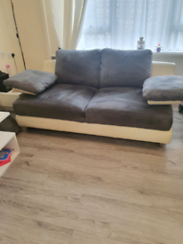Large 2 seater sofa and chair excellent condition 