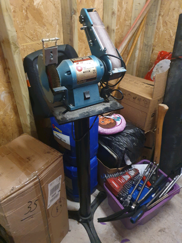 Clarke 6" bench grinder with sanding belt model CBG6SB on stand in