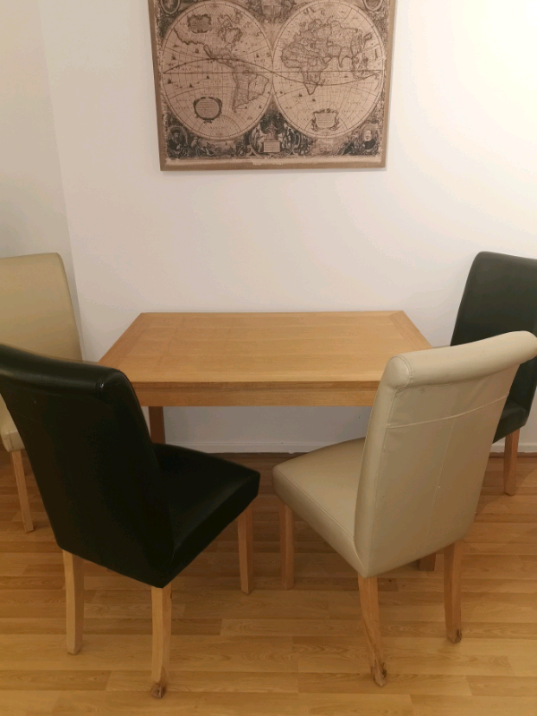 Kitchen table with black and cream leather chairs | in Antrim Road, Belfast | Gumtree