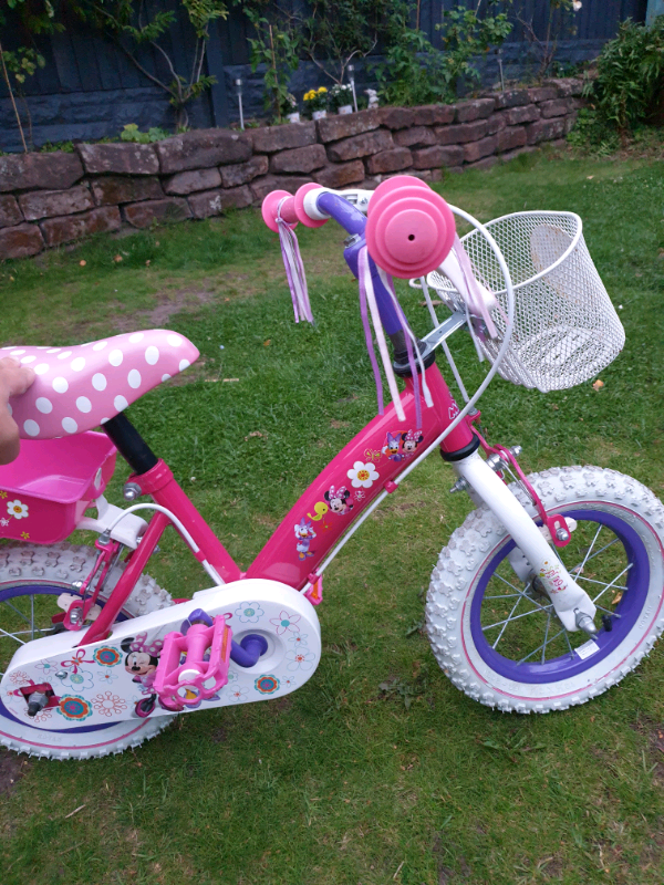 minnie mouse bike with doll carrier