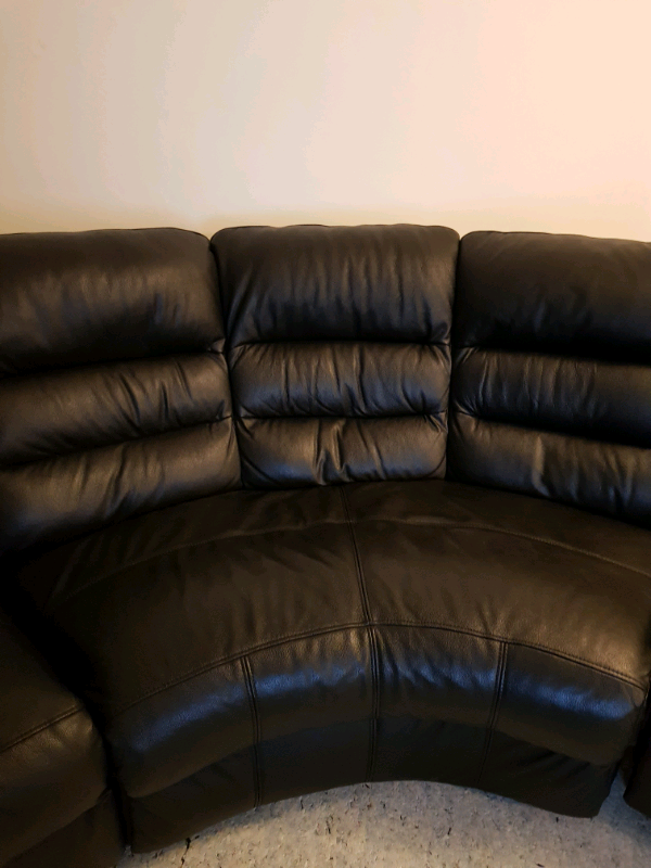Black leather reclining curved sofa in Wortley, West Yorkshire Gumtree