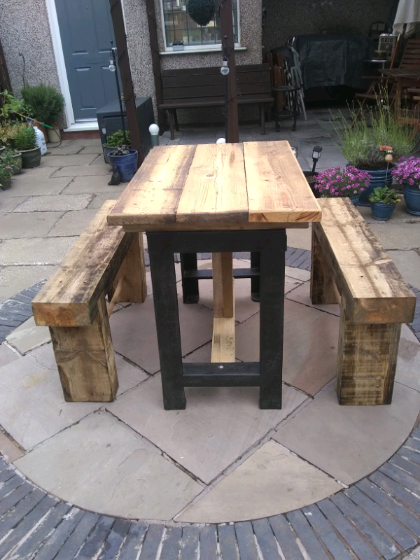 Garden furniture cast iron table with two benches in Coventry, West