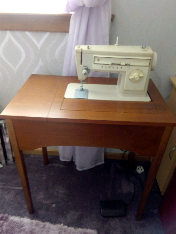 Singer sewing machine built in wooden table in Kilwinning, North