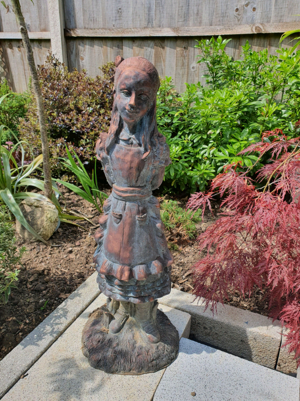 disney alice in wonderland garden statues
