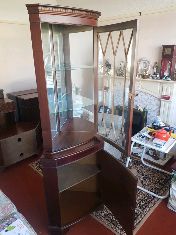 A Dark Wood Locking Glass Corner Display Cabinet In Poole
