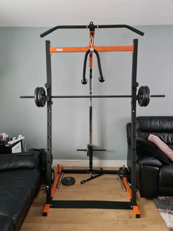 Heavy duty squat rack and lat pulldown low cable pulley system. in