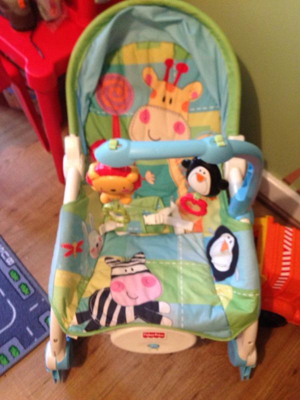 Fisher price vibrating seat grows with baby to toodler seat. Free toys
