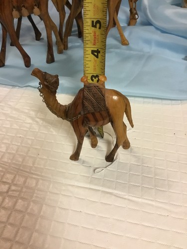 Set Of Five Handcarved Teakwood Camels