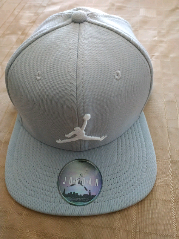 grey and white jumpman