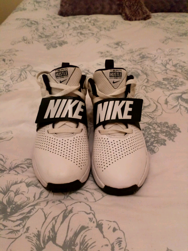 basketball shoes one white one black