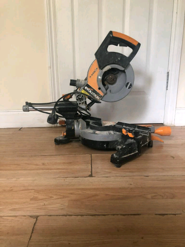 EVOLUTION 255MM ELECTRIC SINGLEBEVEL SLIDING MITRE SAW in Romford