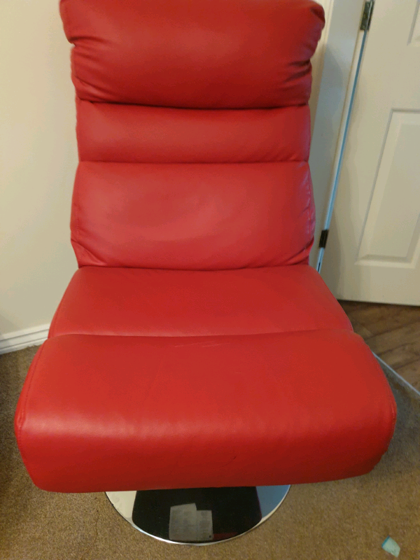 Argos Costa Swivel red leather chair with foot stool. | in Nottingham
