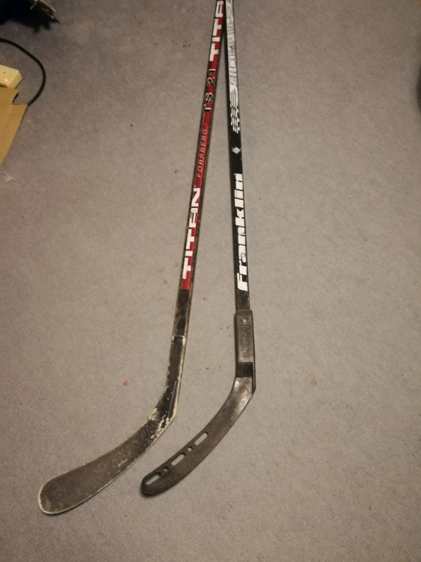 Titan / franklin Street roller ice hockey sticks in Basingstoke