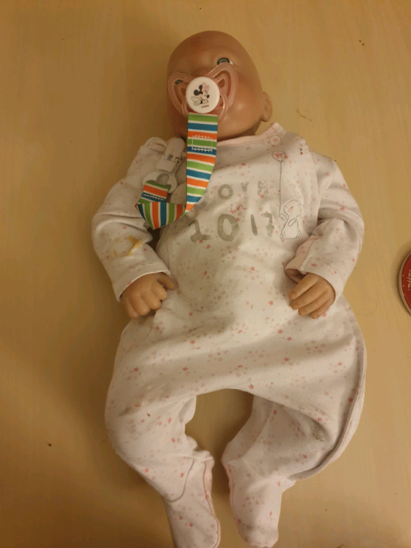 Reborn doll comes with dummy and baby bottle with milk in in