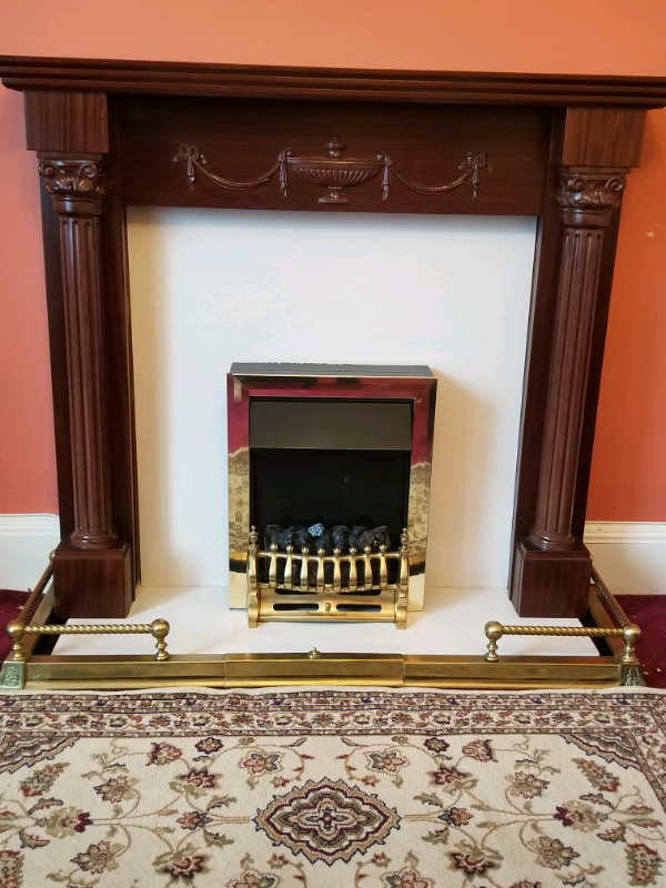 Fireplace Surround With Electric Fire Granite Hearth And Brass Trim In
