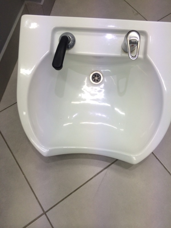 REM barber Hairdresser salon front wash basin sink in Ealing, London