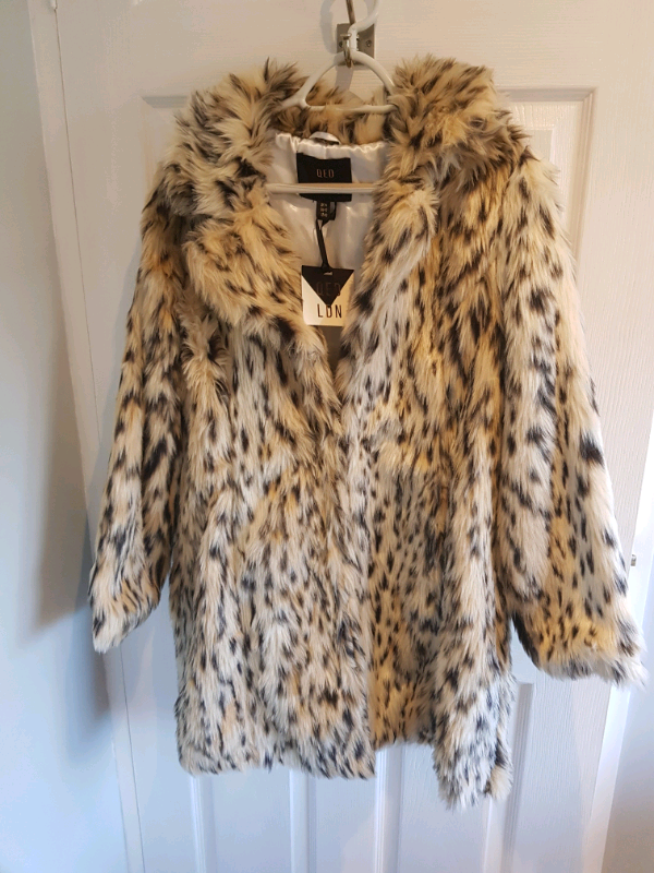 Leopard print faux fur coat size 14 | in Ampthill, Bedfordshire | Gumtree