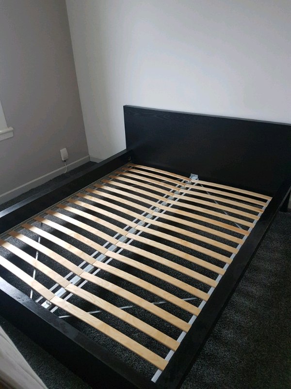 Ikea black Malm kingsize bed frame with optional mattress in