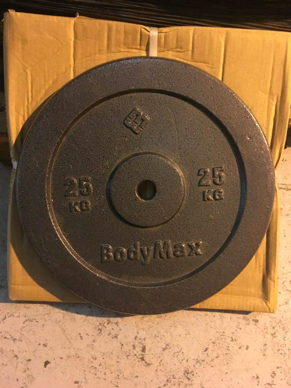 2 x 25kg standard weights. Brand new and boxed in Bolton, Manchester