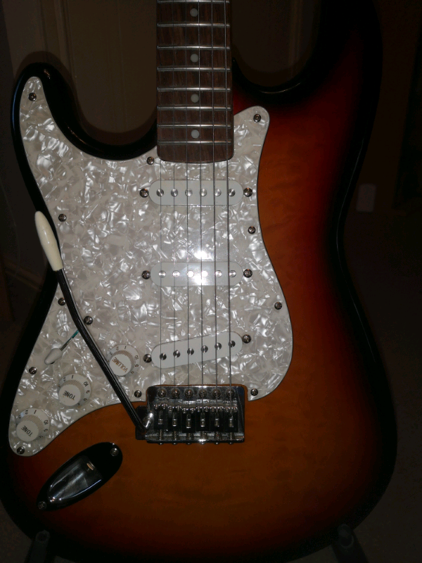 Vintage brand left handed Strat style guitar in Wishaw, North