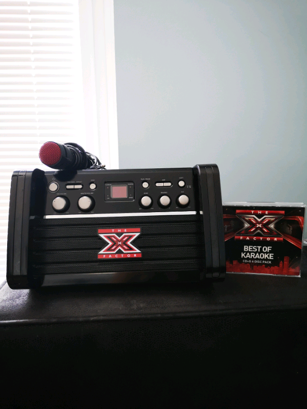 The X Factor CDG karaoke machine with LED light effect & 6 disc cd set
