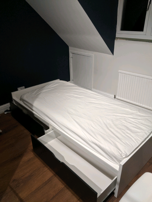 Ikea single bed with Luroy slatted base and two storage drawers in