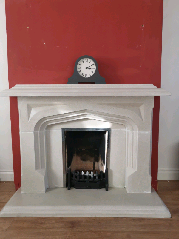 Fireplace Mantel And Hearth In White Stone Fire Place Surround