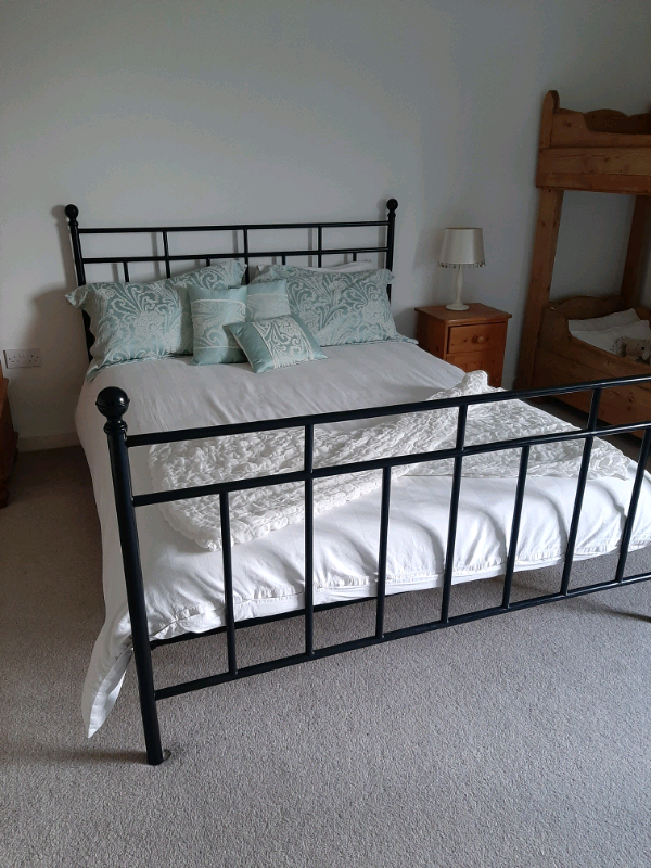 Black wrought iron King size bed in Norwich, Norfolk