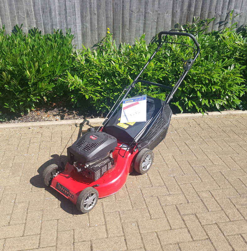 Champion 18 inch petrol selfpropelled fourwheel lawn mower in
