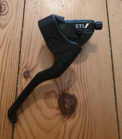 Shimano STI 7 speed shifters and brake levers.