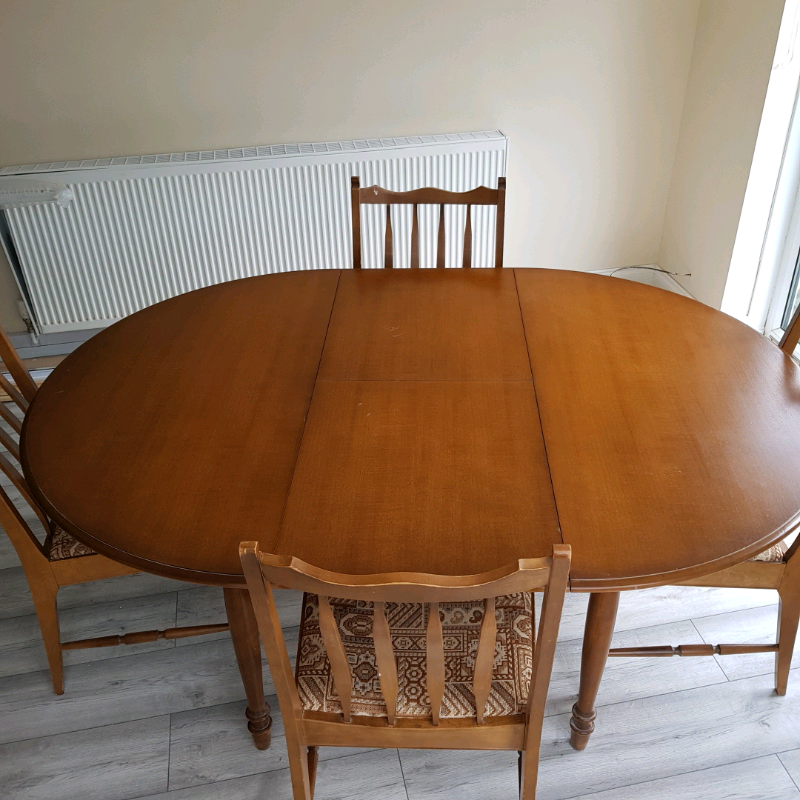 Dinning Table (Stag Minstrel) Extendable Table sits 46 Persons in