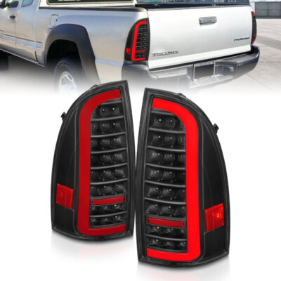 ANZO Full LED Tail Lights w/Light Bar Sequential Black for 05-15 Toyota Tacoma