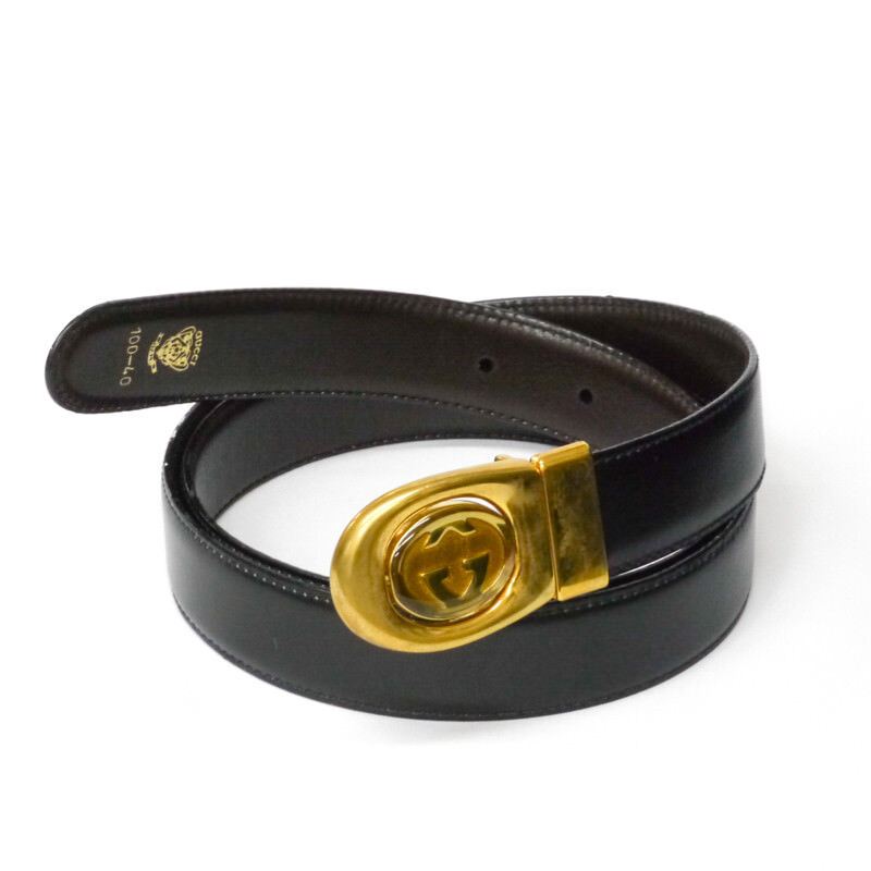 vintage 80's gucci men's reversible belt black / dark brown vintage 80's gucci men's reversible belt black / dark brown