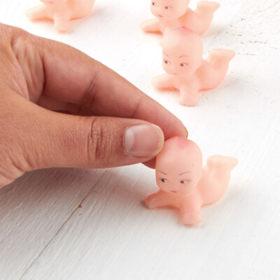 Bulk Package of 48 Soft Vinyl 1-1/2'' Long Kewpie Baby Dolls
