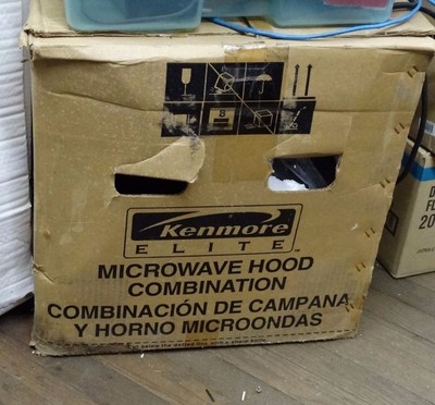 Kitchen microwave hood combination NOS black  by Kenmore Elite