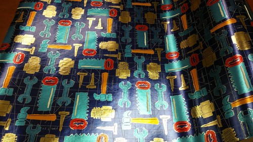 Half ream 24 inch wide Hardware and tools foil gift wrap 417 feet