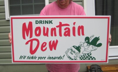 31.5'' x 15.75'' Mountain Dew Embossed Steel Sign  It'll Tickle Your Innards