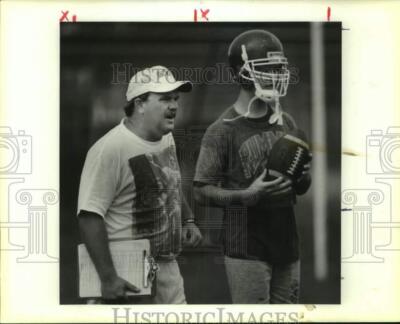 1991 Press Photo Rummel football coach Marc Martin watches action in practice