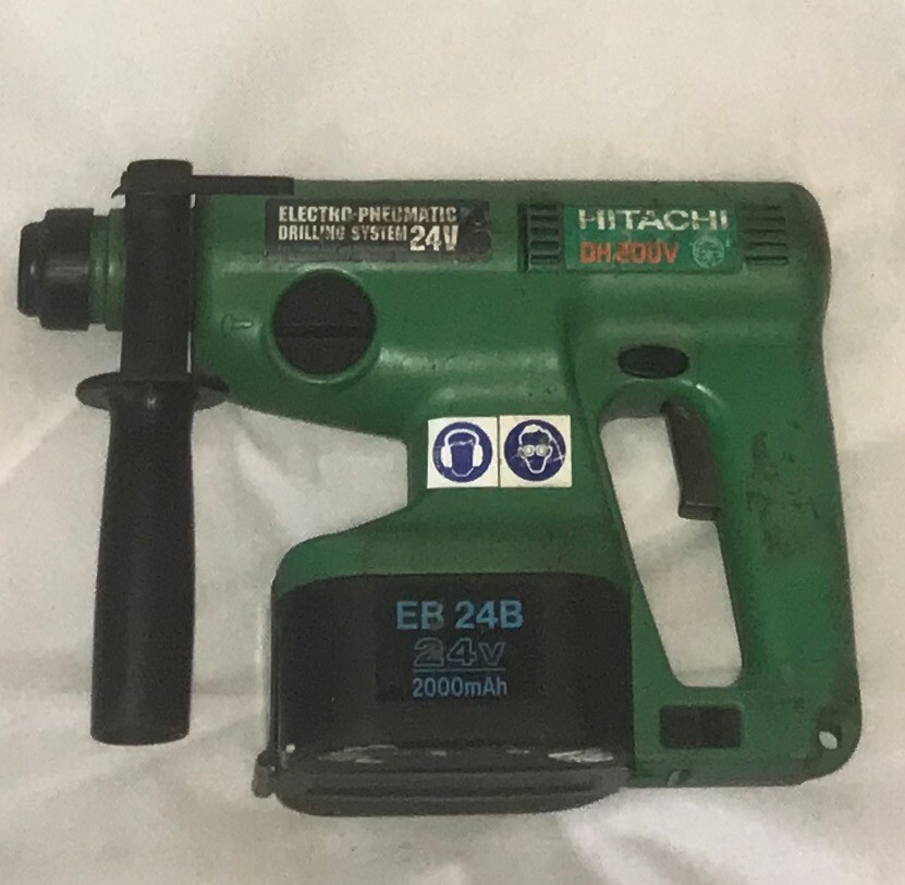 Hitachi cordless SDS drill. 24V with 1 battery, charger and case in