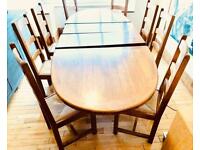 Solid oak dining table and 8 chairs