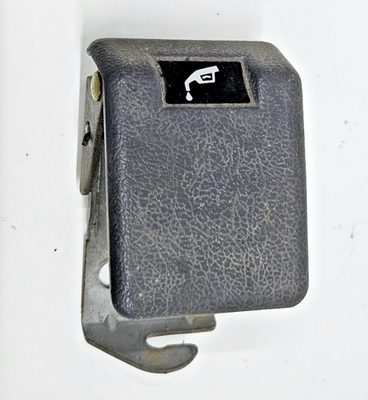 MB023215 Maniglia sgancio blocco coperchio riempimento carburante Pajero 2 V2 V3