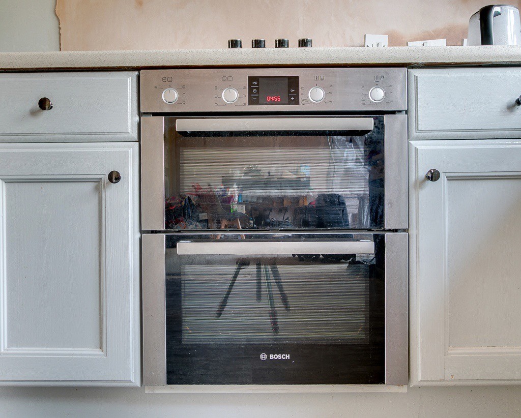 Bosch built under electric double oven. Good condition. 2 years old