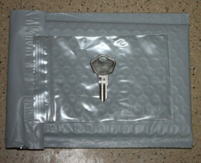 1 key Sentry Safe with code on the front of the lock A-B-C-G-H-I-J-K-L-M-O-U-W-Z