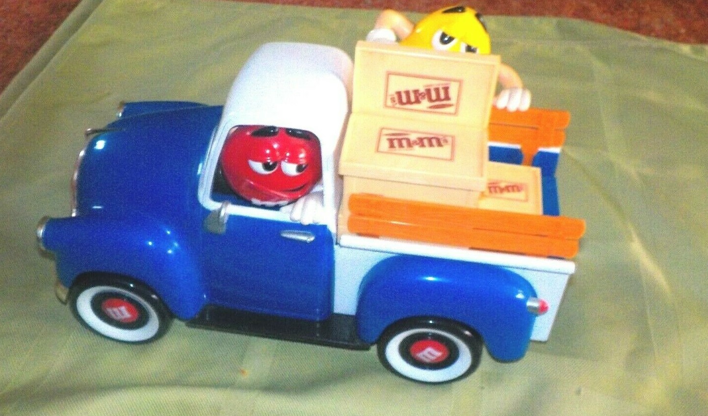 M&M Blue & White old Truck w/Red m&m driving &Yellow one M&M Blue & White old Truck w/Red m&m driving &Yellow one