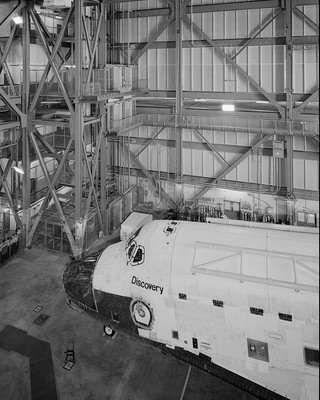 View of the port side nose of Space Shuttle Orbiter Discovery in VAB Photo Print
