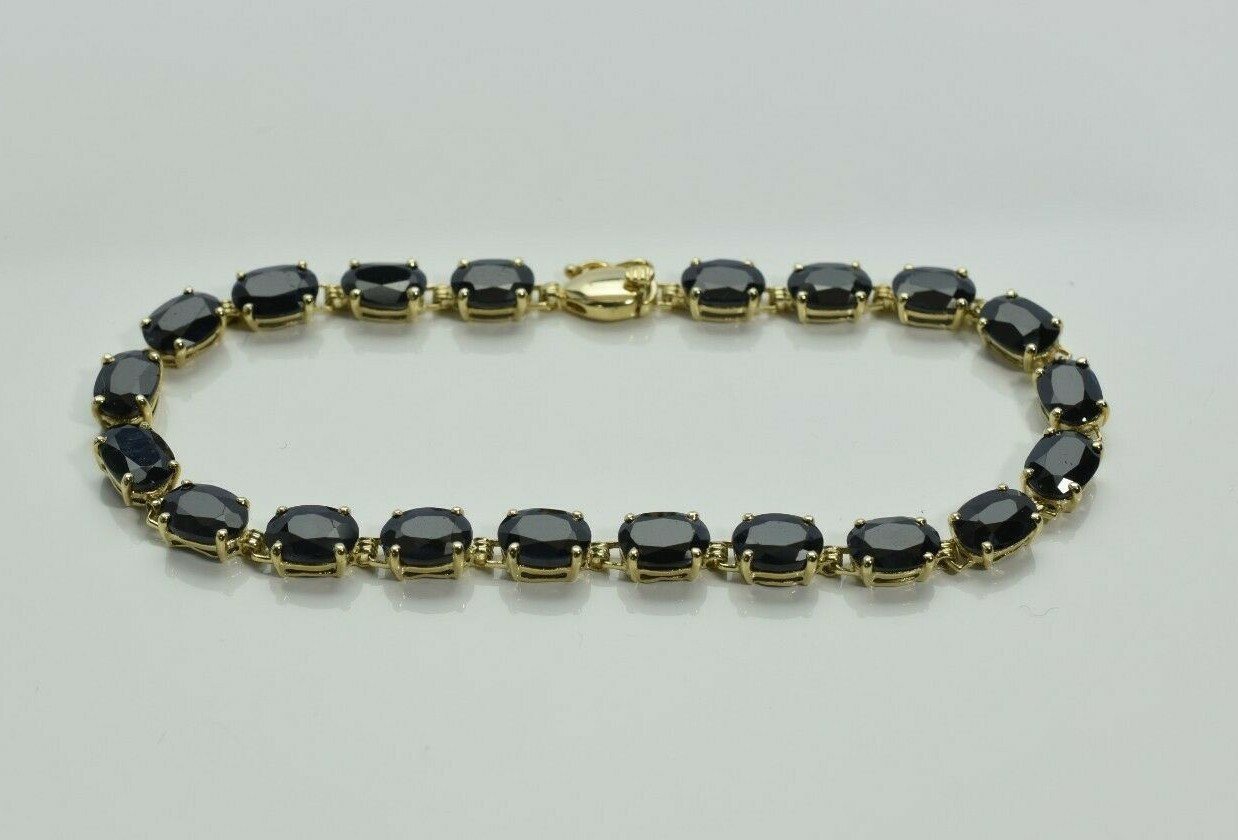 1105-102ブレスレット 10K YG Dark Oval Sapphire Bracelet with 20 Stones Circa 1980