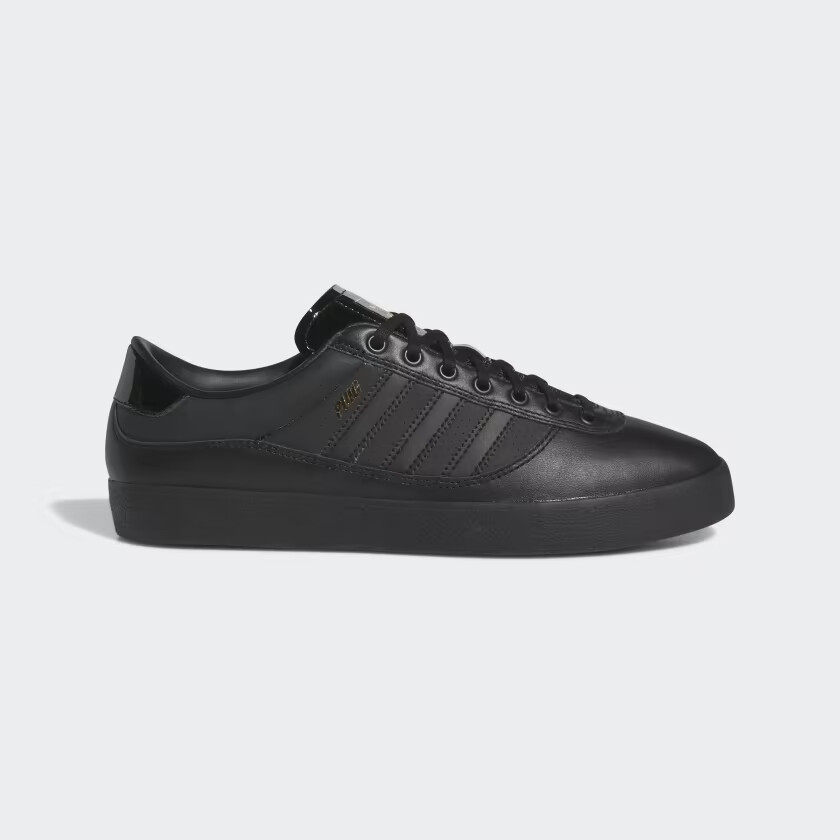 

Обувь adidas PUIG INDOOR Core Black / Core Black / Gold Metallic IG5238, Черный, adidas Puig