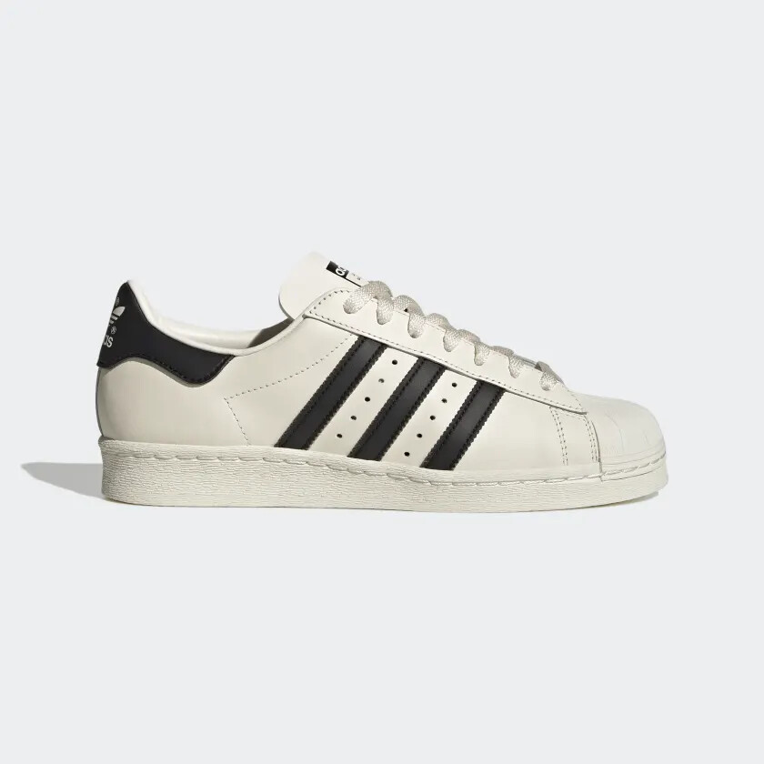 

Мужская обувь ADIDAS SUPERSTAR 82 Обувь Cloud White / Core Black / Off White H06258, Белый, SUPERSTAR 82 SHOES